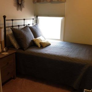 Messy guest room - after simply organized